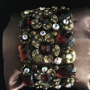 Vintage-Inspired Gold Tone Bracelet with Dark Red Stones